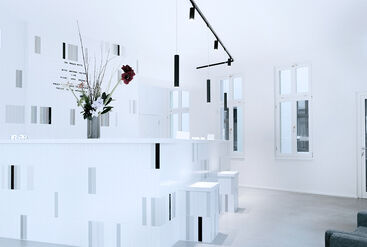 Reception area in the dental practice Die Praxis Mitte in tile optics.